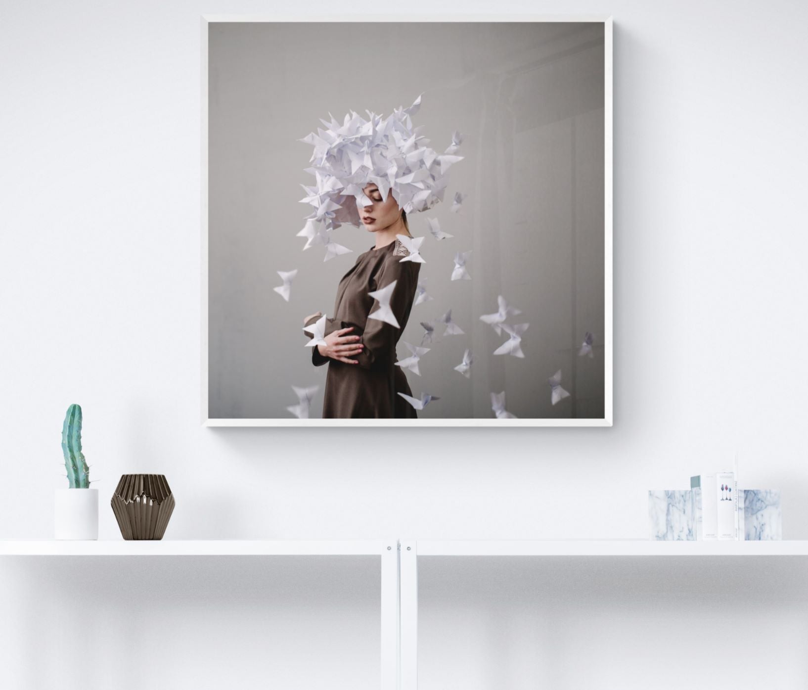 Paper butterflies ascend around a quiet figure in soft, surreal tones.